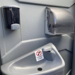 sink inside deluxe portable toilet