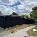 temp fence rental 2 with black privacy